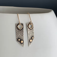 silver and gold modern earrings with see-through cut-out framed in 14k gold and 2 gold accent dots with 14k ear wires