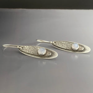 embossed sterling silver earrings in long ovals with gemstones