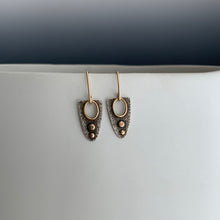 rough textured modern design earrings with gold accents and gold ear wires