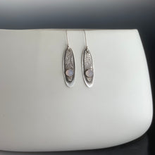silver earrings with faceted chalcedony gems