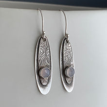 patterned silver earrings with chalcedony stones