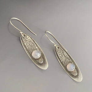 silver long oval shaped earrings with 6 mm blue chalcedony gemstones