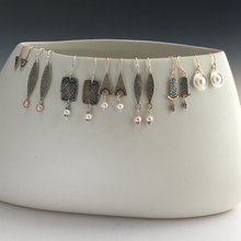 New pearl earrings collection.