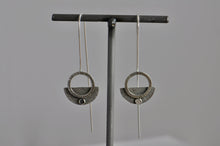 front view of sterling earrings with silver chiseled circle on half circle design