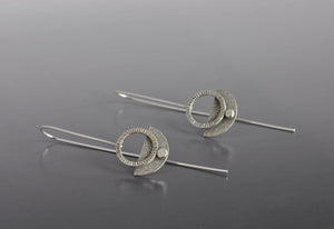 modern textured sterling silver earrings with silver ear wires