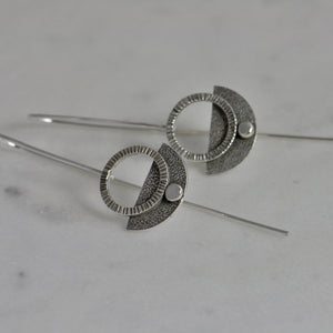 silver long hanging earrings with modern design