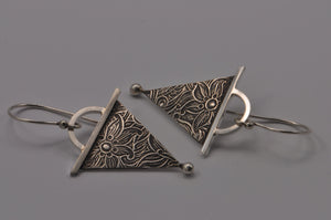 sterling silver dangle earrings with embossed pattern and modern design